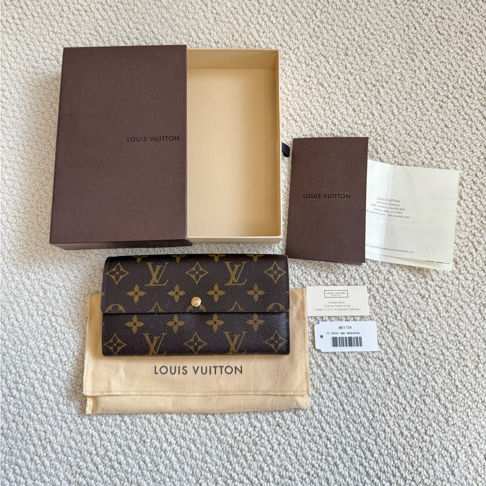 Authentic LOUIS VUITTON Sarah Wallet in Monogram Print